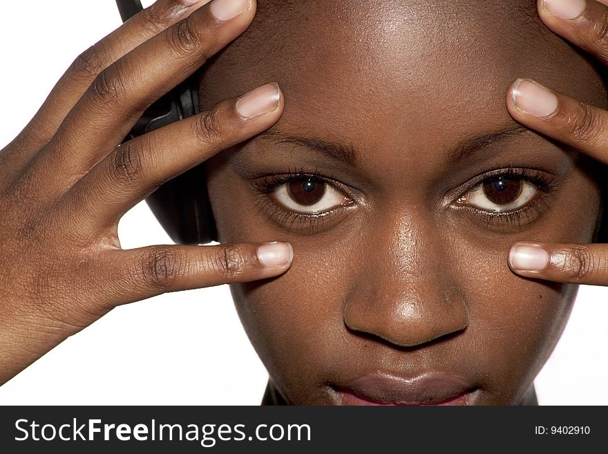 Young woman  listening to music , eyes closeup. Young woman  listening to music , eyes closeup