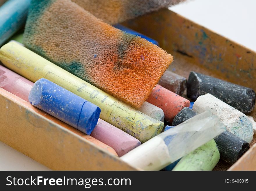 Pastel crayon and other art tools macro. Pastel crayon and other art tools macro