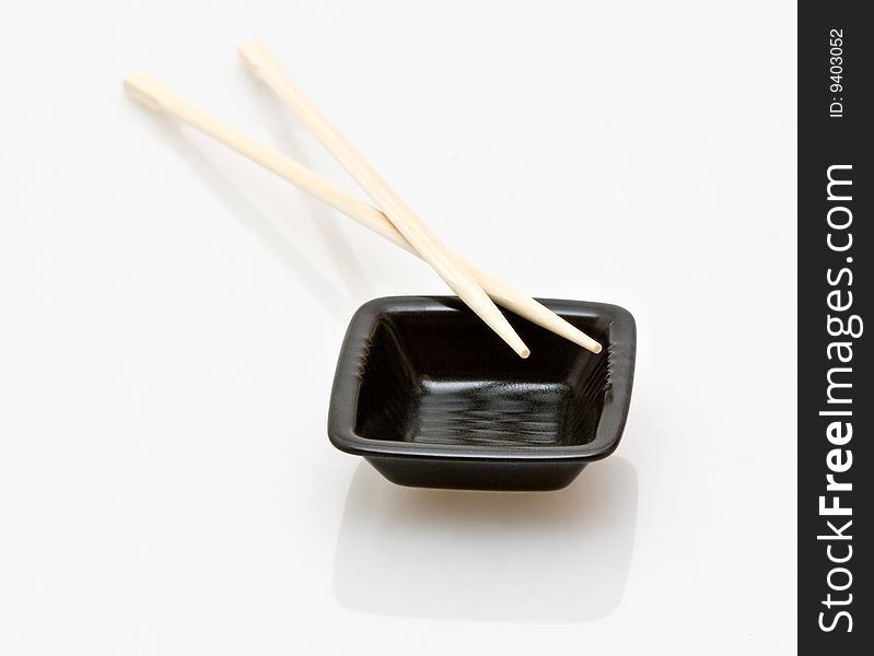 Chopsticks and a wasabi dish