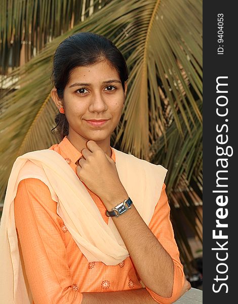 A smart and expressive Indian girl with her traditional dress. A smart and expressive Indian girl with her traditional dress.