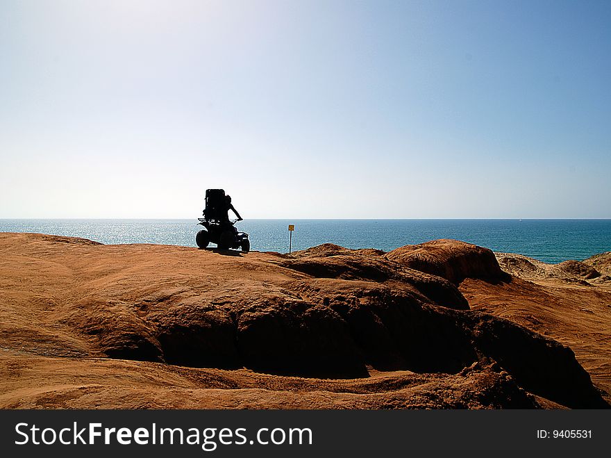 Adrenalin driving. Dune Buggy riding on a sea cliff. Adrenalin driving. Dune Buggy riding on a sea cliff.