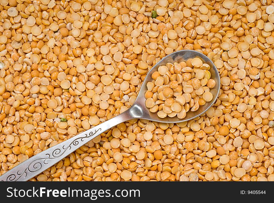 Dried-up  split peas background, close-up, cooking ingredients