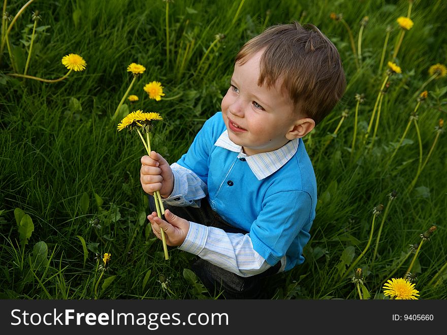Boy with a bunch of flowers