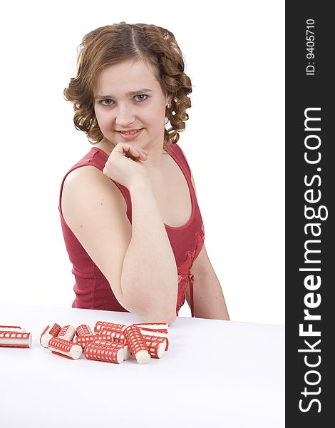 Woman with curlers. Young attractive housewife with hair rollers.  Isolated on white in studio. Woman with curlers. Young attractive housewife with hair rollers.  Isolated on white in studio.