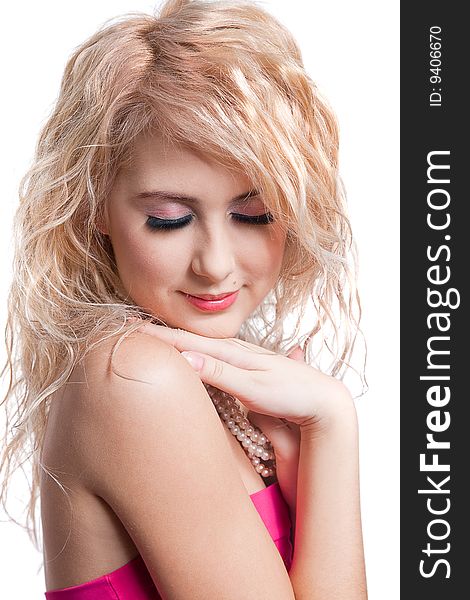 Beautiful girl with beads over white background