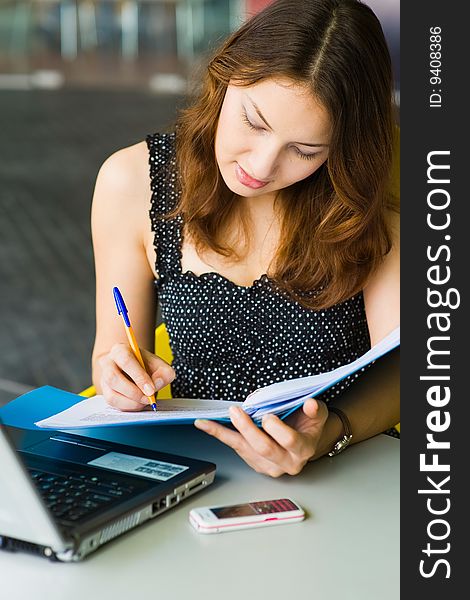 Young Pretty Caucasian Lady Using Laptop Outdoors