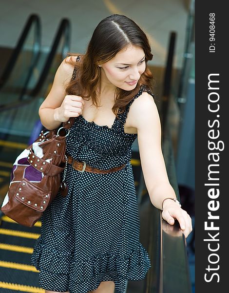 A young pretty caucasian lady outdoors