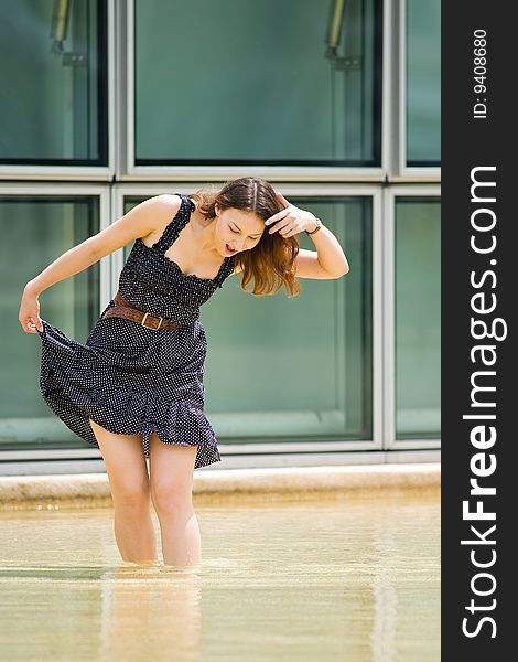 A young pretty caucasian lady having fun outdoors. A young pretty caucasian lady having fun outdoors