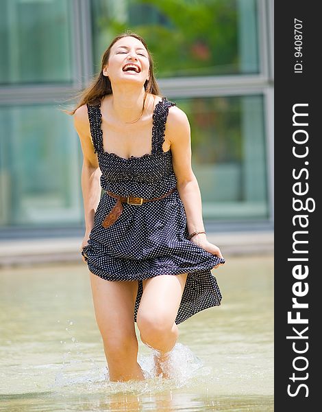 A young pretty caucasian lady having fun outdoors. A young pretty caucasian lady having fun outdoors