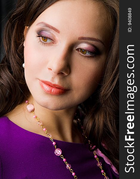 Face of beautiful girl with beads