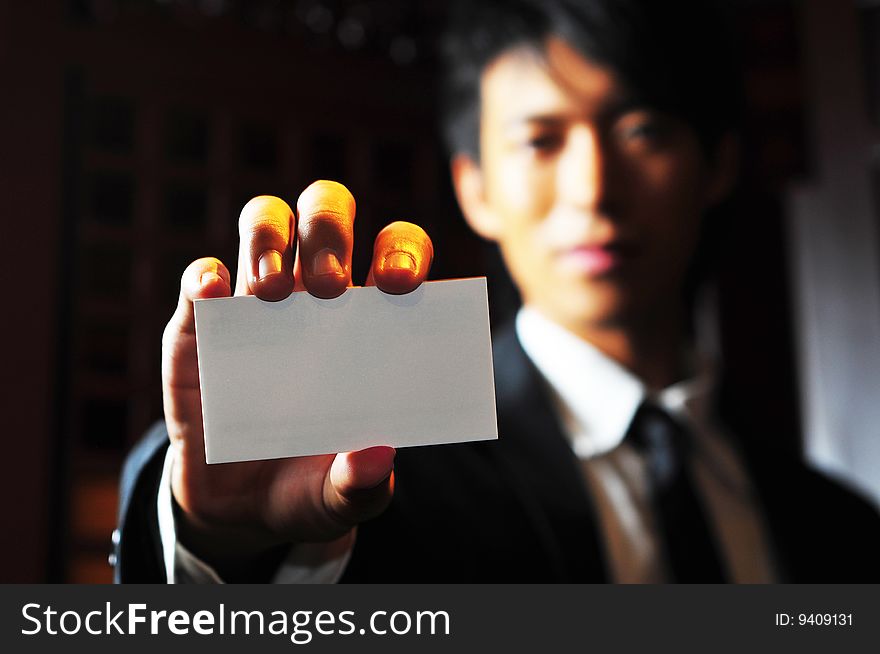 Smart Asian man in business suit in chinese temple. Smart Asian man in business suit in chinese temple