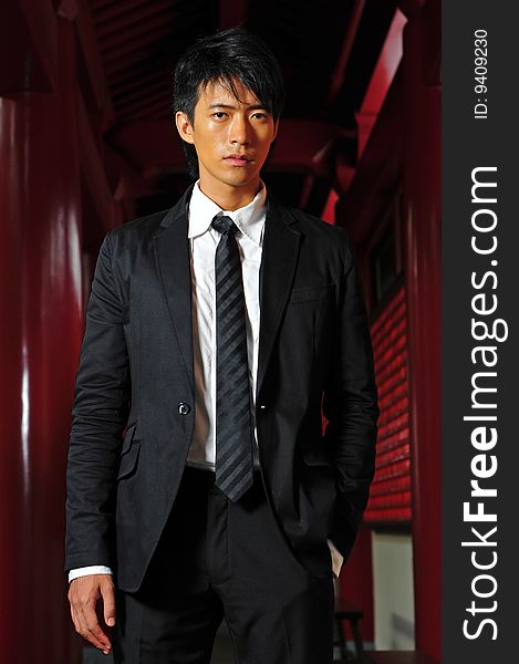 Asian Man In Suit And Tie