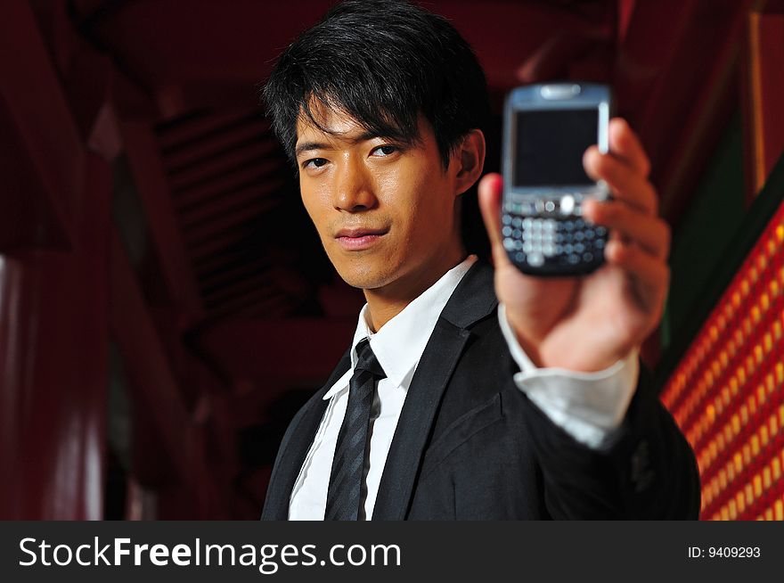 Asian Man and Mobile Phone