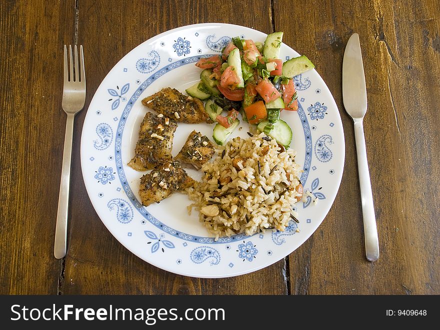 Plate with marinaded fish and garnish