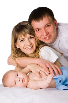 Mother And Father Holding Their Little Child Royalty Free Stock Image