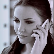 Woman With Cell Phone Stock Photography