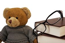 Teddy Bear, Glasses And A Pile Of Old Books Stock Photo Teddy Bear, Glasses And A Pile Of Old Books Stock Photo