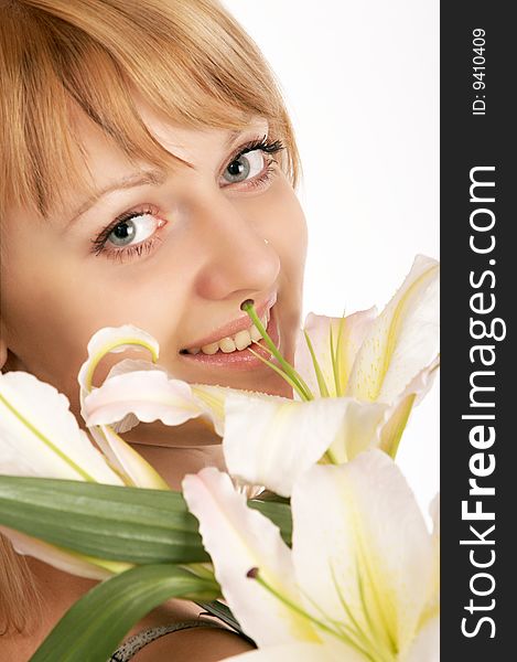 Close up glamor girl posing isolated on white with flowers. Close up glamor girl posing isolated on white with flowers