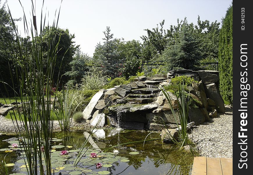 Garden detail of waterfall in a japanesse garden