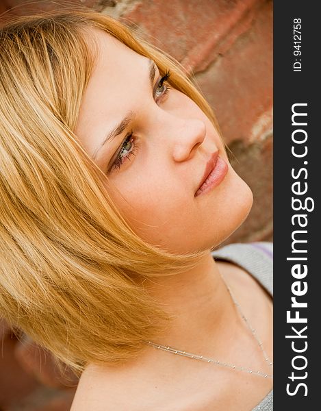 Portrait of young beautiful woman outdoor