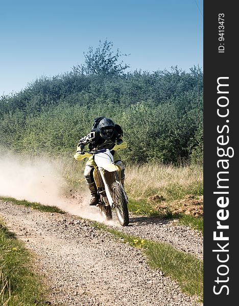 An enduro rider fast moving  on motocross.