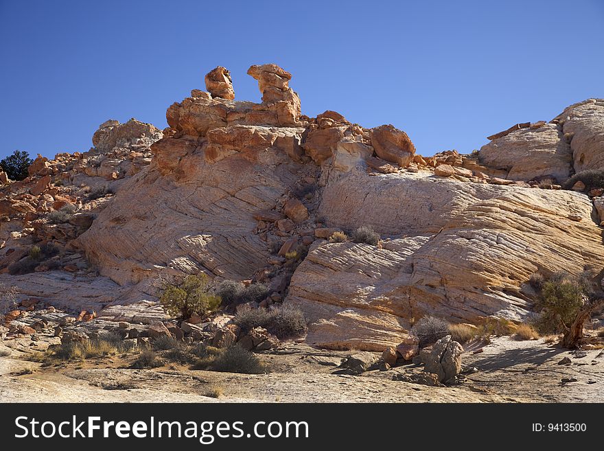 View of red rock formations in San Rafael Swell with blue sky�s