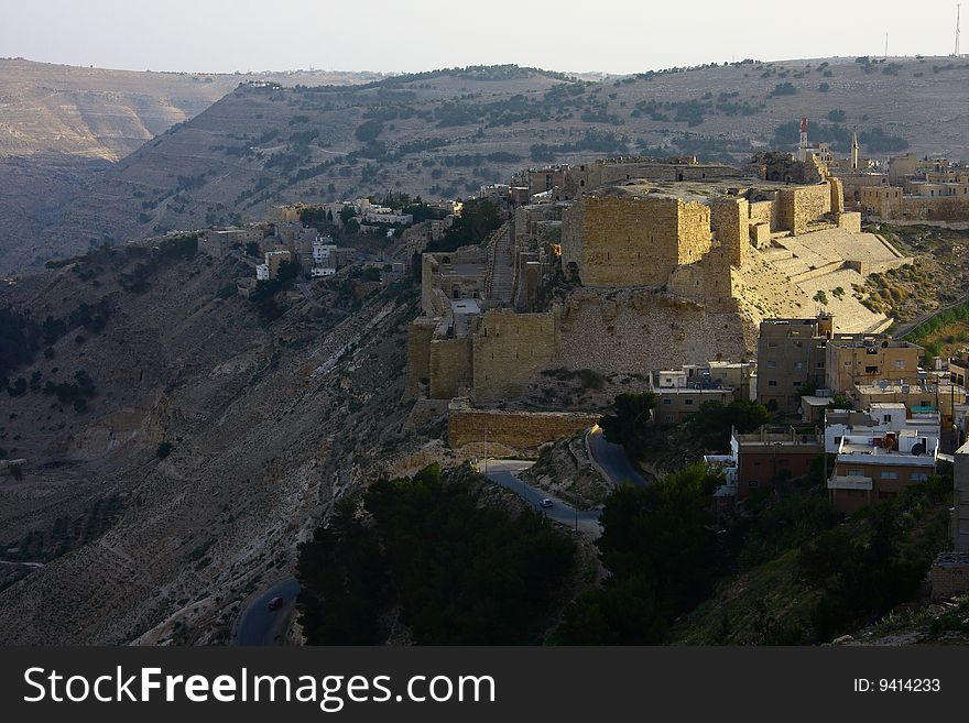 This castle is located in the city of Karak, about 150 km south of Amman (The capital of Jordan) middle east, and about 50km est of the Dead Sea. Karak sits 900m above sea level, The city today is home to around 150,000 people. This castle is located in the city of Karak, about 150 km south of Amman (The capital of Jordan) middle east, and about 50km est of the Dead Sea. Karak sits 900m above sea level, The city today is home to around 150,000 people