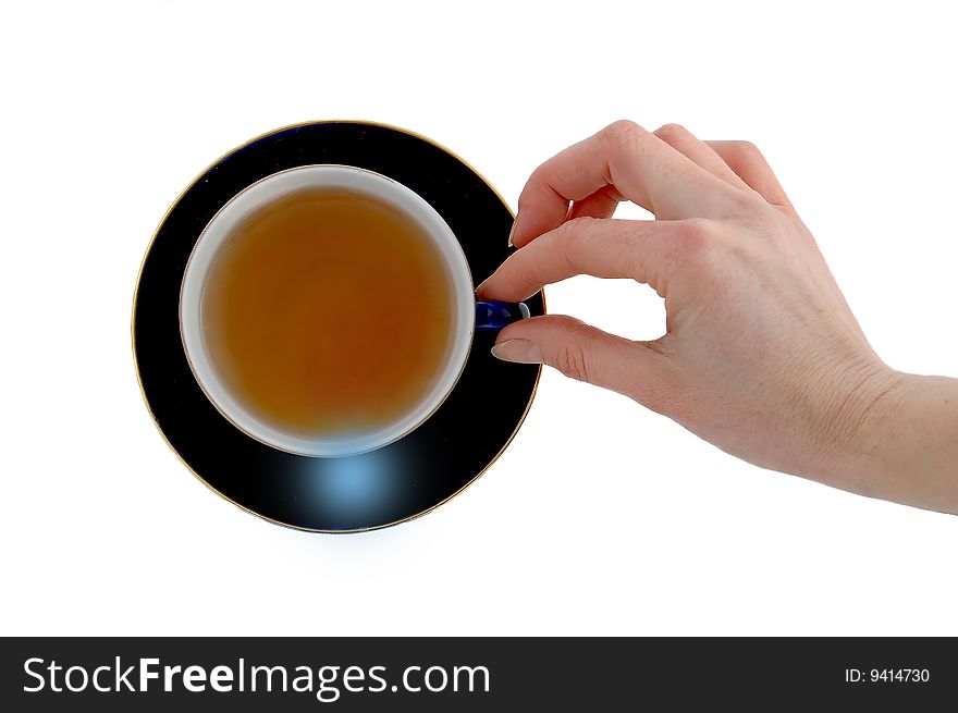 Arm holding cup with tea