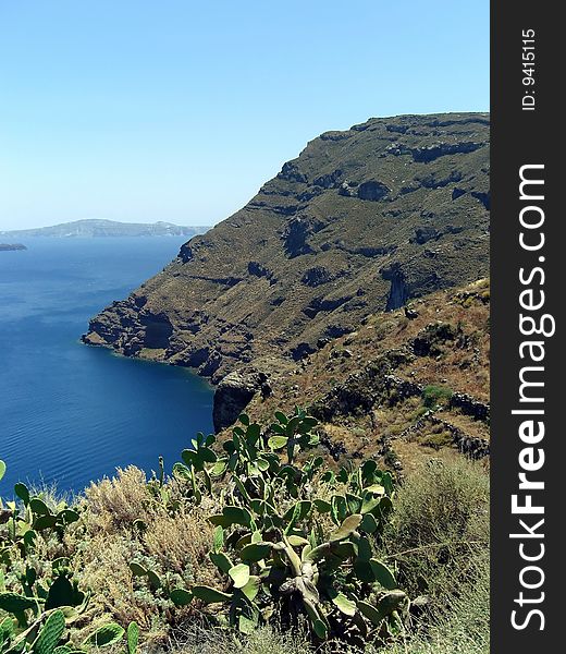 a landscape of Santorini's caldera and volcano. a landscape of Santorini's caldera and volcano