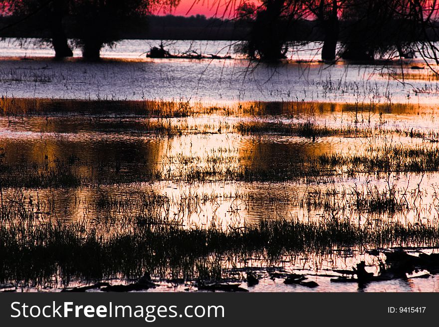 Nice reflections of a sunset on the water. Nice reflections of a sunset on the water.