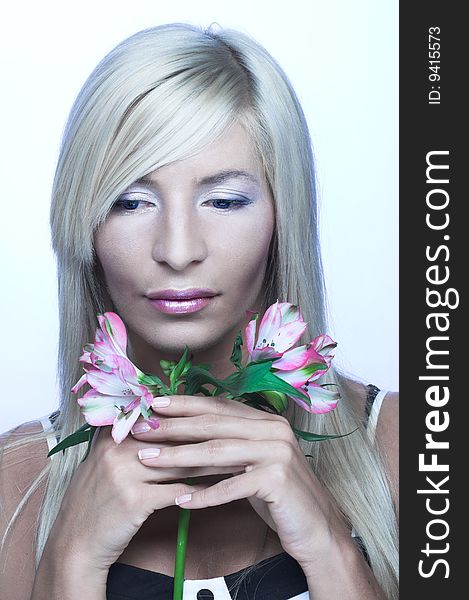 Portrait Of Young Woman With Flowers