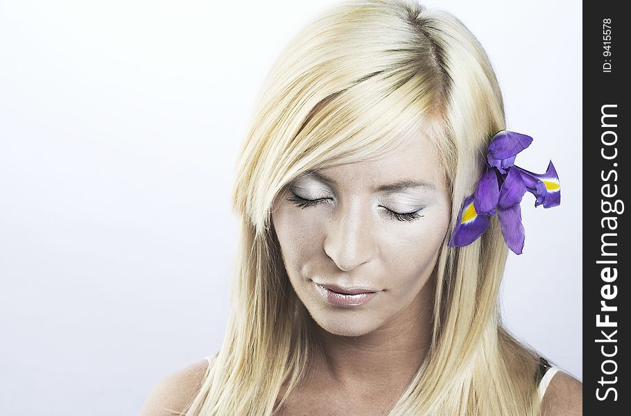 Young Woman With Iris In Her Hair