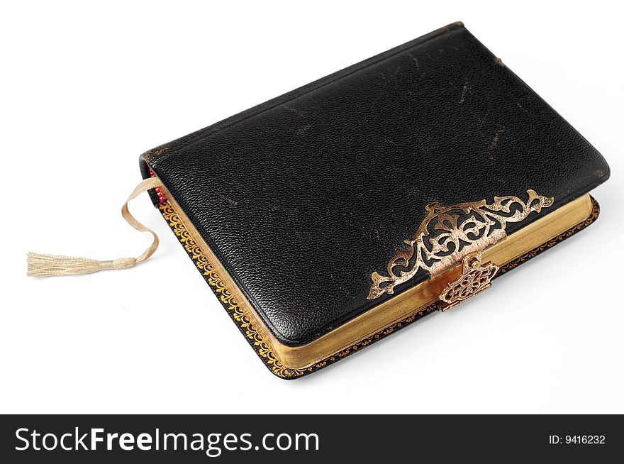 Old Bible isolated on a white background, with clipping path.