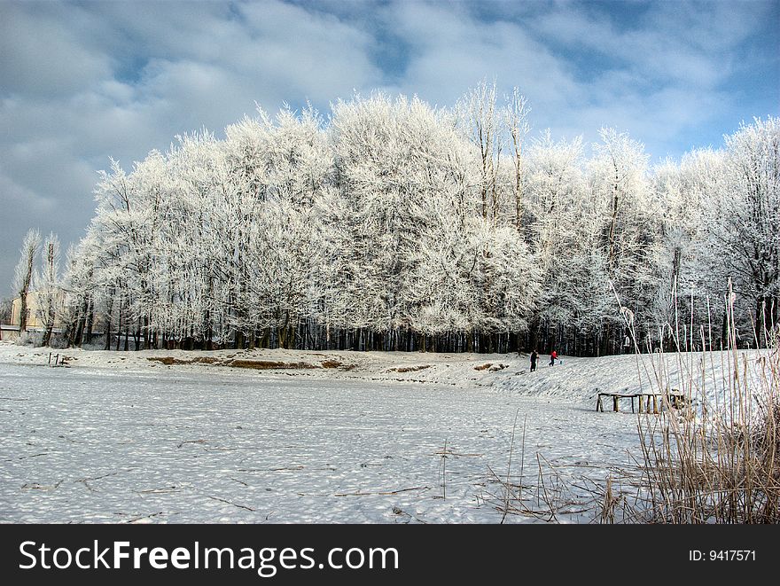 A beautiful frosty morning is on the middle of lake. A beautiful frosty morning is on the middle of lake