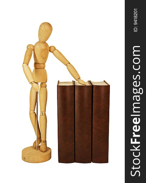 Wooden dummy and pile of old books isolated on a white background