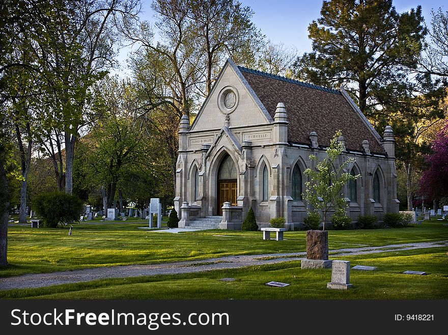 An old stone church in a cemetery