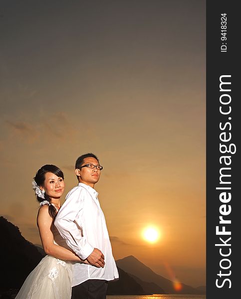 A wedding dress photograph at sunset