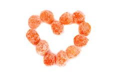 Heart Made Of Orange Candies Stock Images