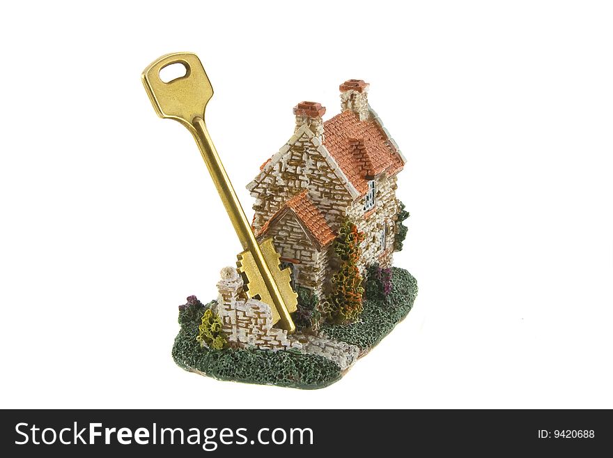 The house with key isolated over white background