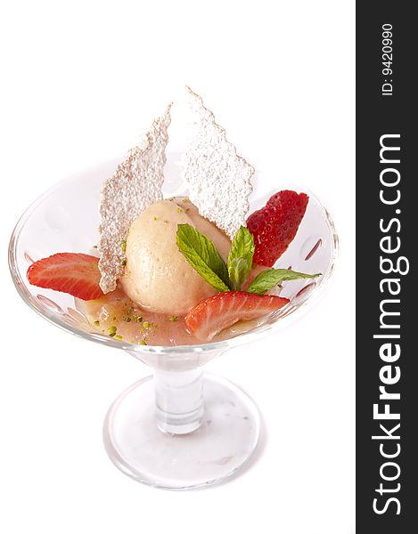 Gourmet ice cream in a bowl with strawberry isolated