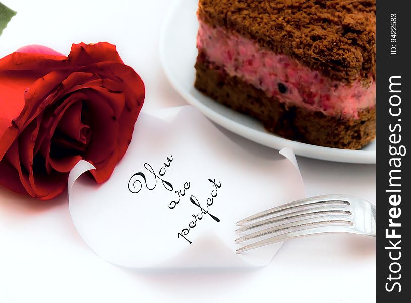Love letter adpressed with fork and rose.