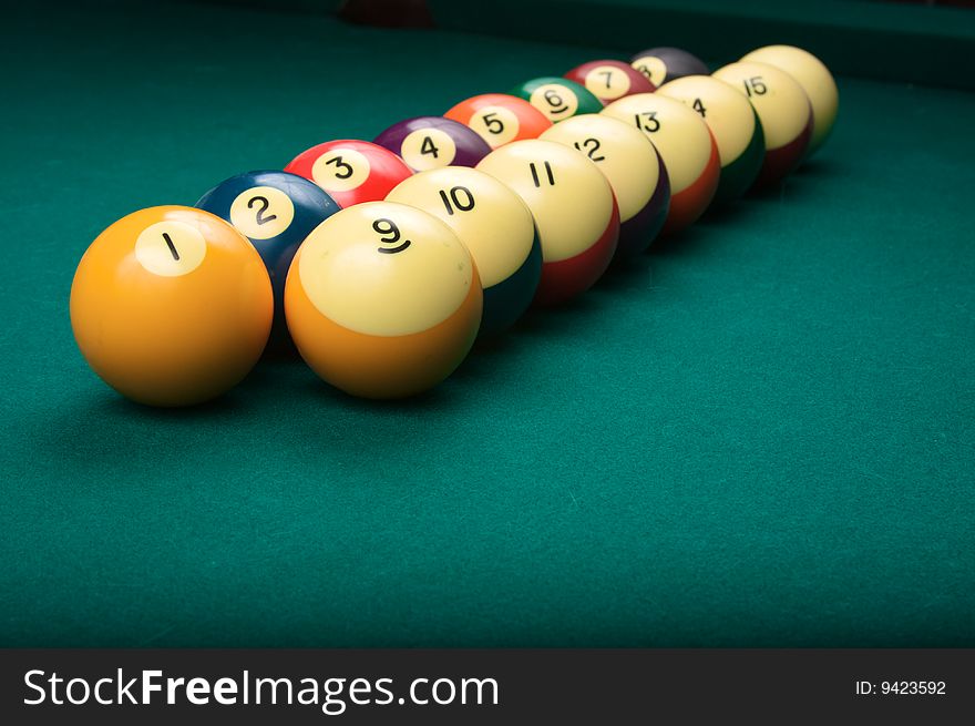 Billiard balls arranged in order from one to fifteen, shallow depth of field. Billiard balls arranged in order from one to fifteen, shallow depth of field