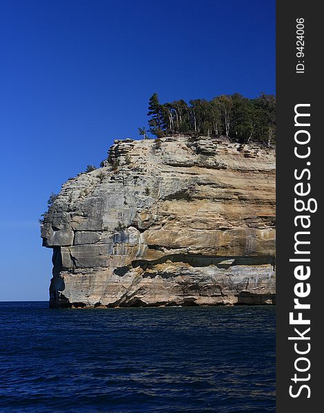 Indian Head Rock in Munising, Michigan, USA. Pictured Rocks state park on lake superior. Indian Head Rock in Munising, Michigan, USA. Pictured Rocks state park on lake superior