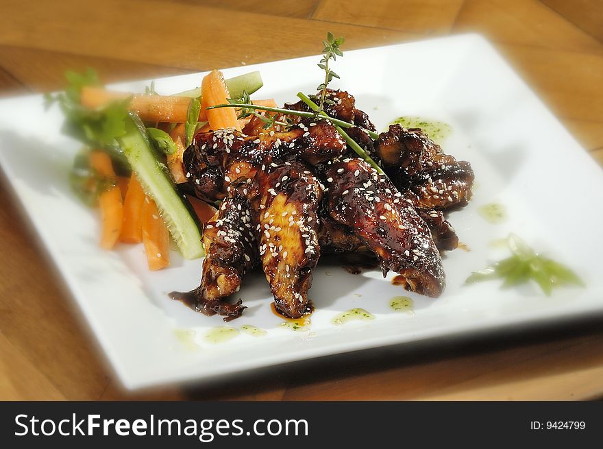 Grilled chicken wings with vegetable