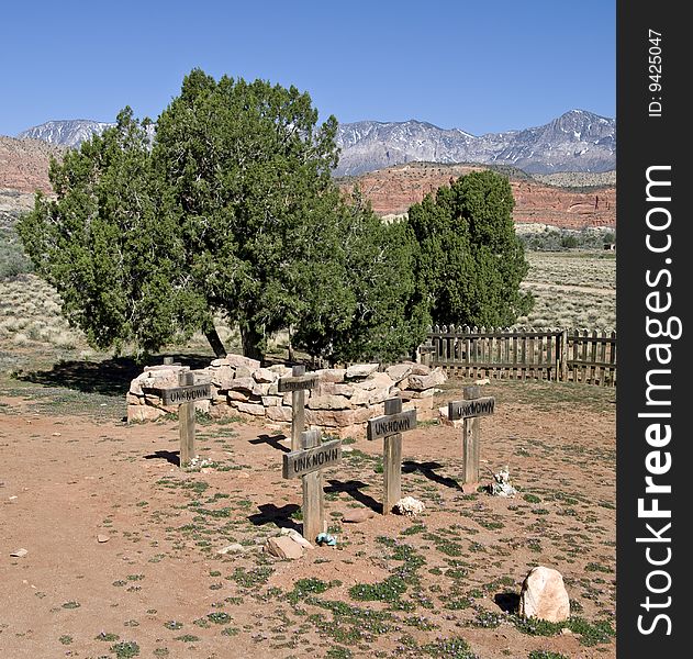 Several graves of unidentified people lie at an old ghost town cemetary near Leeds Utah. Several graves of unidentified people lie at an old ghost town cemetary near Leeds Utah