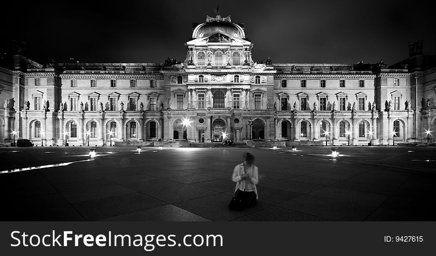 A shot of the Louvre Pyramid at night. A shot of the Louvre Pyramid at night