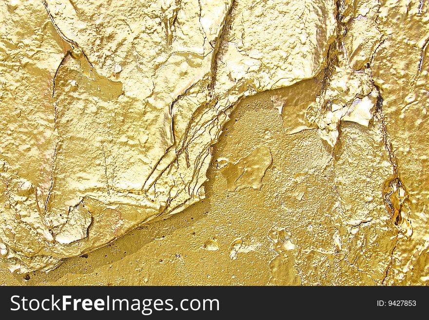 Photo of golden metal with lots of texture. Photo of golden metal with lots of texture