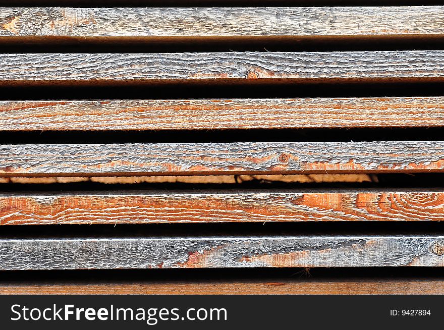 Abstract patterns of wooden boards at a sawmill