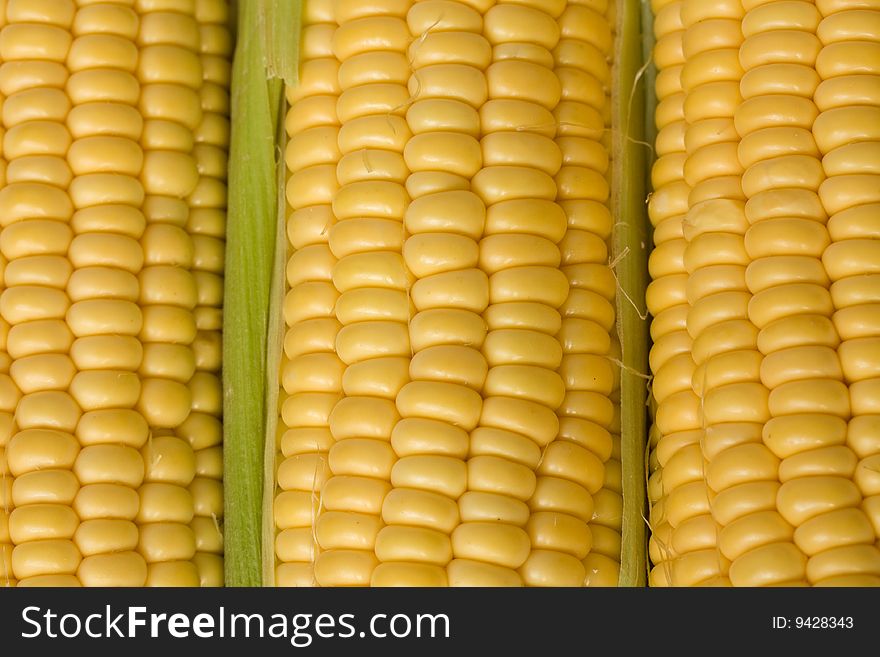 Fresh corn or sweetcorn on the cob closeup