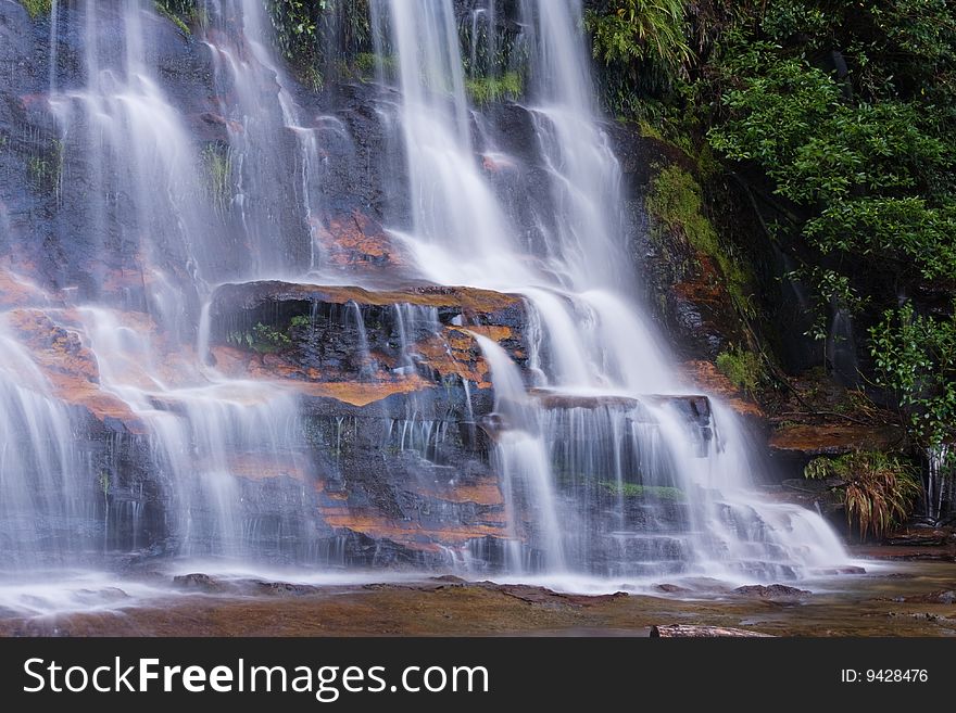 Misty Katoomba waterfalls in Blue mountains National park in NSW, Australia. Horizontal detail composition.